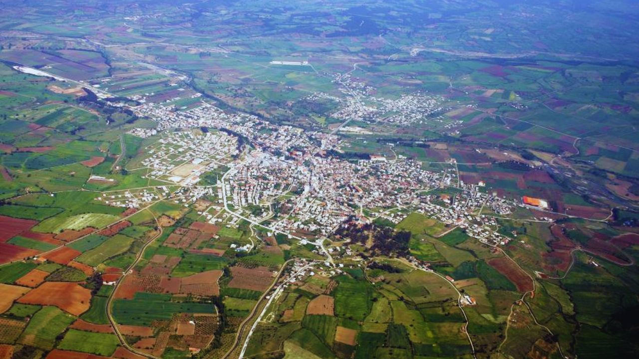 Aerial view of Ezine, Çanakkale, surrounded by cultivated farmland and road networks